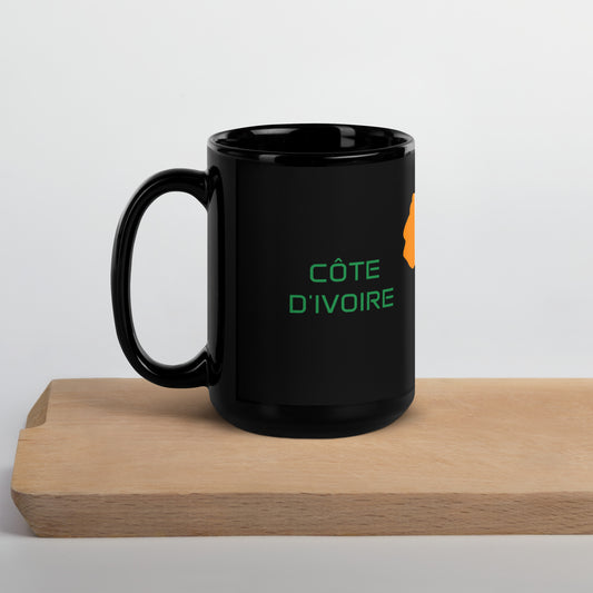 Cote dIvoire flag ceramic mug showing handle and print detail.