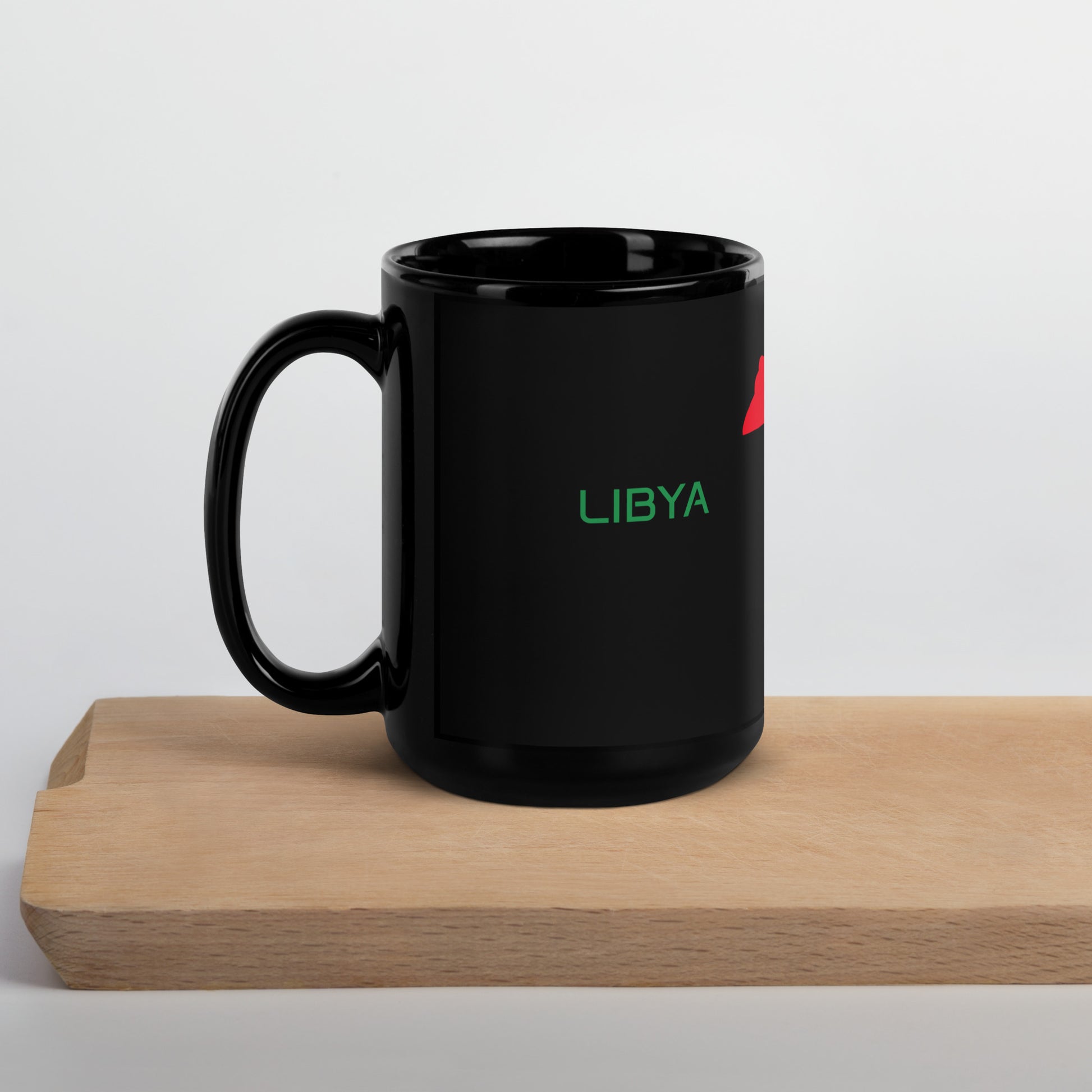 Libya flag ceramic mug showing handle and print detail.