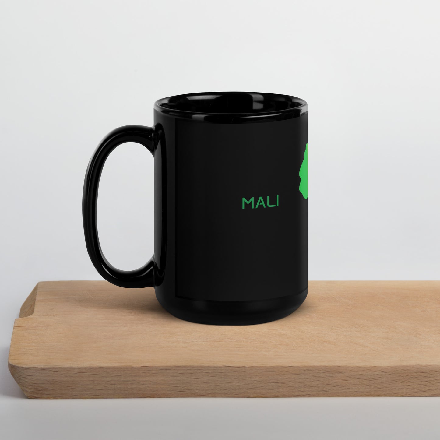 Mali flag ceramic mug showing handle and print detail.
